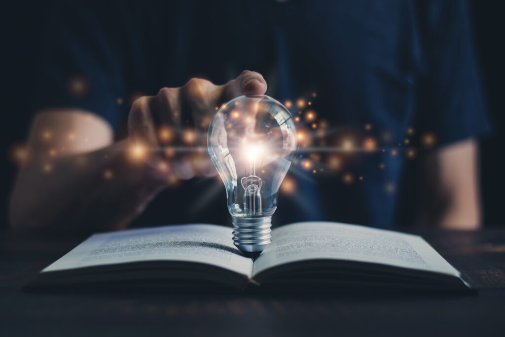 glowing-light-bulb-and-book-or-text-book-with-futuristic-icon-self-learning-or-education-knowledge-and-business-studying-concept-idea-of-learning-online-class-or-e-learning-at-home